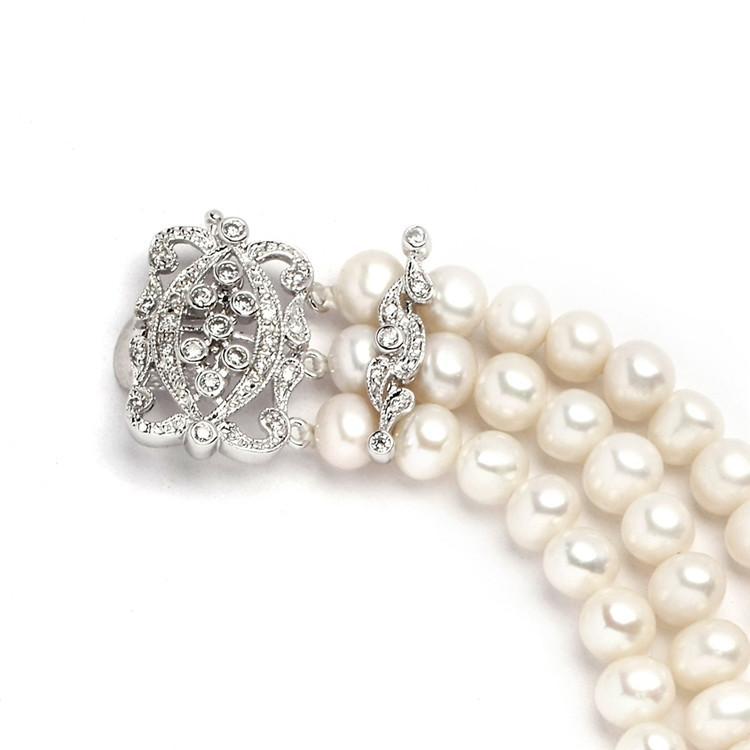 3-row cultured pearls bracelet , clasp silver 835 with r… | Drouot.com